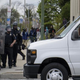A police officer drives a van with a shattered window April 27, 2015, in Baltimore.
BRENDAN SMIALOWSKI/AFP/Getty Images